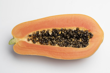 Inside of papaya on white background
