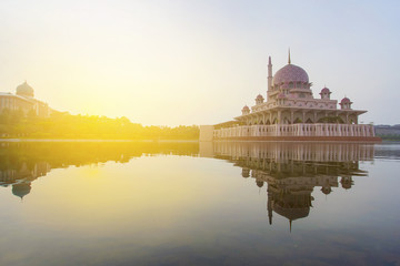 Reflection of Putra Mosque and Prime Minister Office at dusk in Putrajaya, Malaysia.