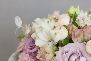 The delicate rustic floral bouquet of rose lilac on grey background
