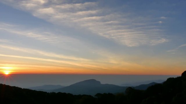 Doi Intanon is a landmark on the highest mountain of Thailand in Chiang Mia province.  Many tourists will visit beautiful scenery of sunrise and mist .