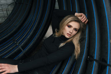 girl posing in the tunnel and enchanting her gaze