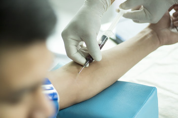 Nursing staff are undergoing a blood test.