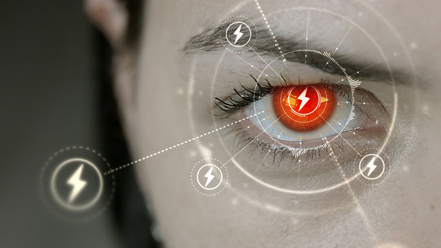 Young cyborg female blinks then thunderbolt symbols appears.