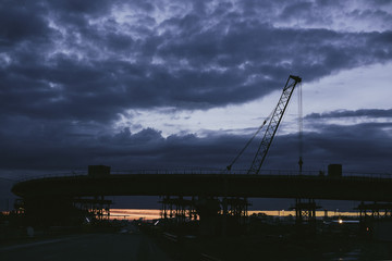 bridge on sunset background, industrial sunset