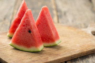 Watermelon on wooden floor