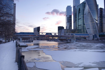 Broken ice on river near Moscow business center