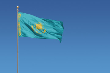 Kazakhstan Flag of in front of a clear blue sky