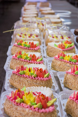 Manual cakes production on factory