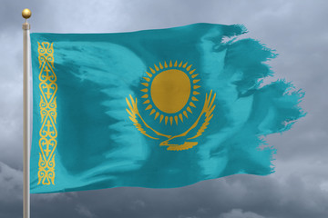 Kazakhstan Flag with torn edges in front of a stormy sky
