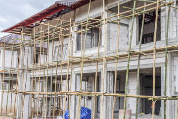 construction residential new house in progress at building site