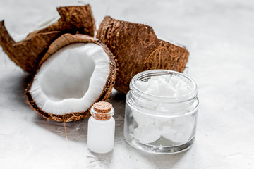 organic cosmetics with coconut on white background