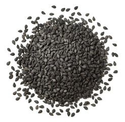 dried black sesame seeds isolated on white