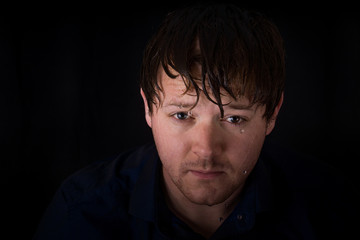 A young man with wet hair