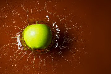 Splashing apple