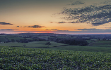 Naklejka na ściany i meble Sunset over Scenic British Countryside