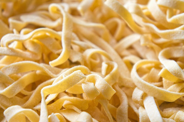 Italian fettuccine pasta closeup with copy space