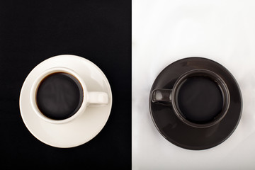 Two cups of black coffee from above