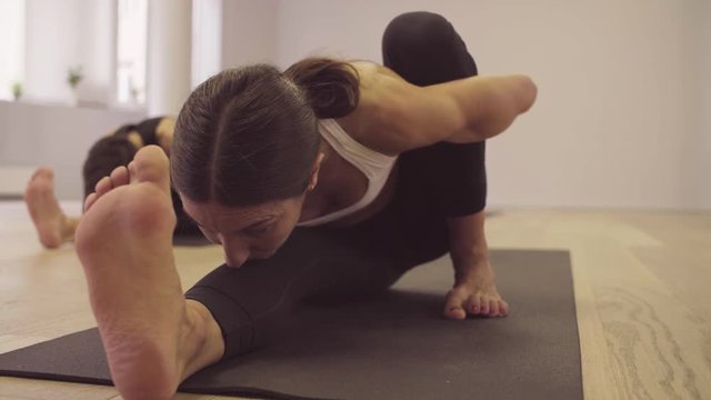 Yoga class. Woman doing yoga asanas