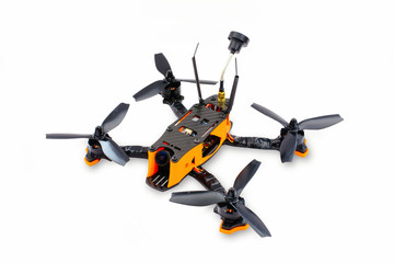 isolated drones racing FPV quadrocopter made of carbon black, drone ready for flight, stylish and modern hobby