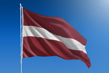 Latvia flag in front of a clear blue sky