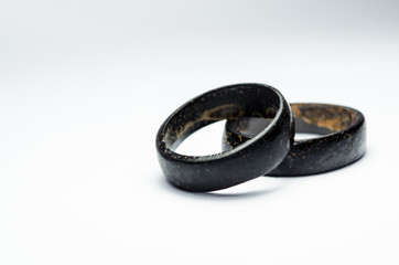 pair of coconut rings together on a white background. Intense black tone. Handicraft common in the northeast of Brazil. indigenous ring. Tucum ring.