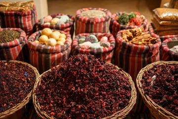 Tea and spices in bags at the orient market in the evening