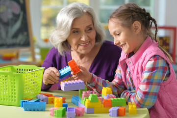 Grandmother playing with granddaughter