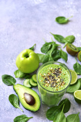 Detox smoothie with green vegetables, oats and seeds.Top view with copy space.