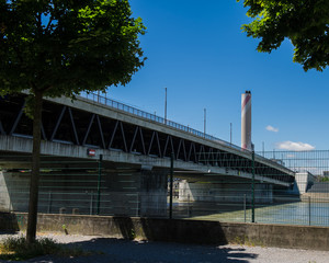 Bridge on the River Rhine, buildings along the river in the city of Basel.