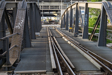 old metal bridge for railway transport and pedestrians in Basel, Switzerland. Europe.