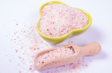 Pink Himalayan salt isolated on white background.