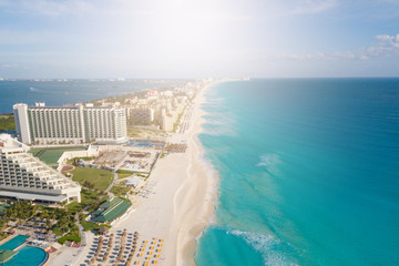 Cancun aerial view. Zona hotelera Cancun beach panorama top view. Caribbean seaside beach with turquoise water and big waves. Yucatan, Quintana Roo, Mexico - obrazy, fototapety, plakaty