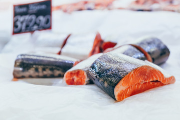 salmon cool fish in ice. sea food. grocery shopping. soft focus