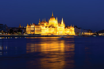Fototapeta na wymiar Spotlighted Parliament building in Budapest at night