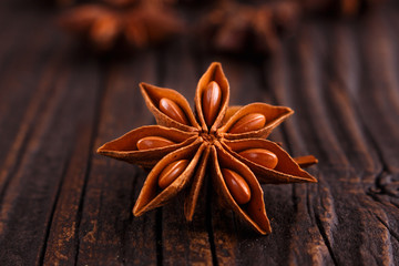 anise stars on a dark rustic background