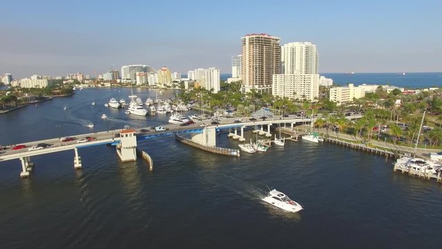 Boat passing drawbridge in Fort Lauderdale, Florida. Aerial view.