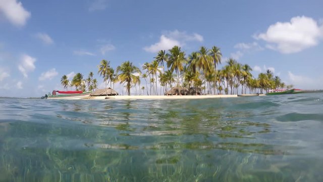 Small Island with palm trees and blue sky - San Blas Islands