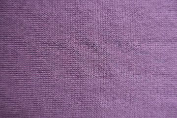 Simple pink handmade knitted fabric from above