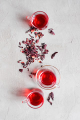Tree glass cups of hibiscus tea