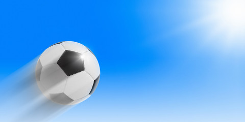 Football flying into the sky to the sun