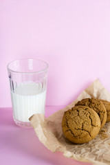homemade cookies and milk pink background
