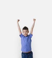portrait of a handsome young teen boy winning over white background