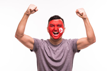 Victory, happy and goal scream emotions of Tunisia football fan in game support of Tunisia national...