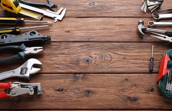 Repair tools on wood background with copy space