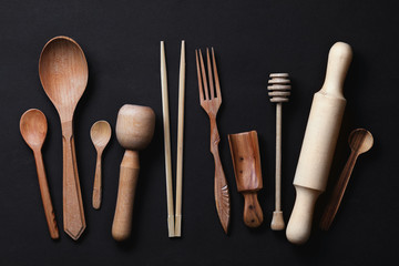 Various wooden kitchen utensils photographed from above, close-up