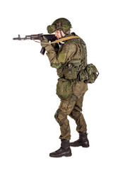 russian special forces soldier with rifle on dark background. army, military and people concept