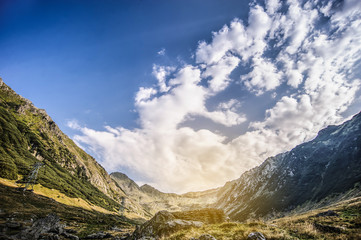 Obraz premium Foot mountain view on sunset