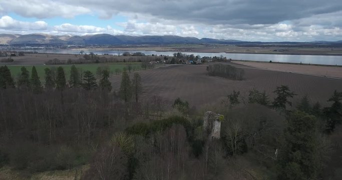 Aerial footage of  Elphinstone Tower near Airth in Central Scotland. A ruined tower house built in the 16th century.
