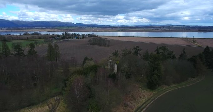 Aerial footage of  Elphinstone Tower near Airth in Central Scotland. A ruined tower house built in the 16th century.