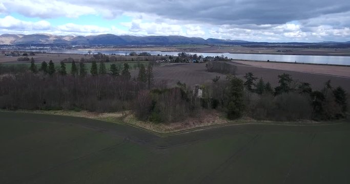 Aerial footage of  Elphinstone Tower near Airth in Central Scotland. A ruined tower house built in the 16th century.